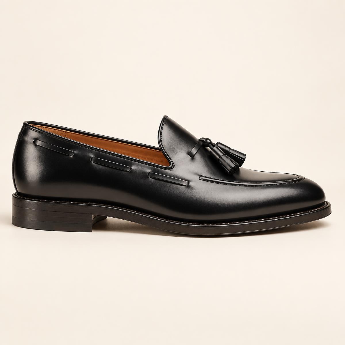 The Tassel Loafer in black calf, side profile